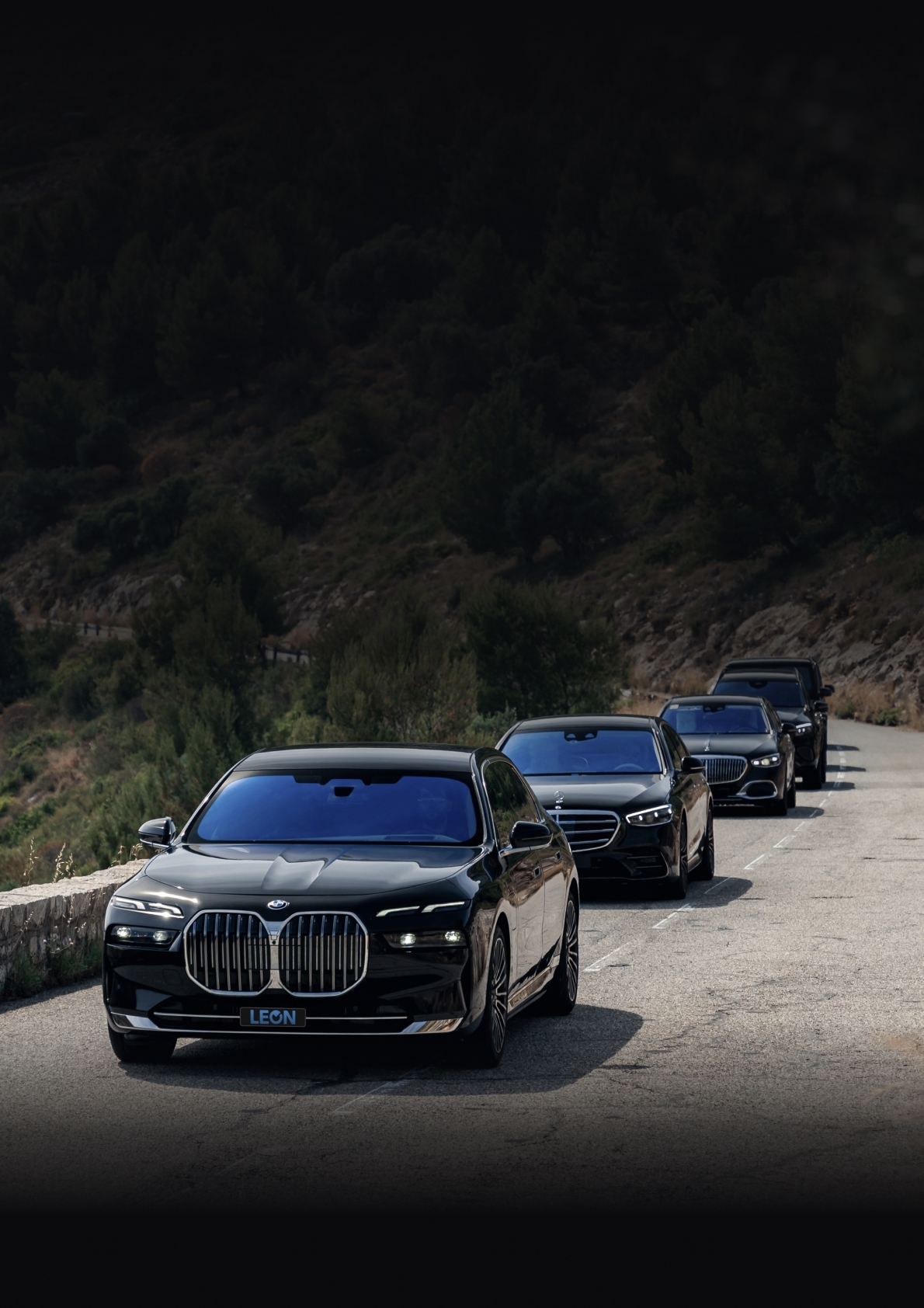 Convoy of LEON sedans on a coastal road